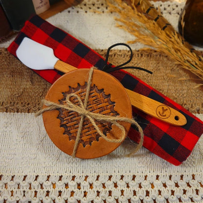 western gift set with handmade (inverted startburst basket weave) leather coasters, white mini-spatula, and red/black plaid towel